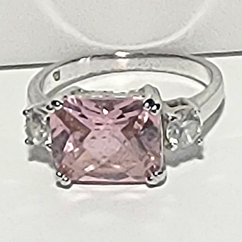 Sterling silver ring with cushion style pink stone.